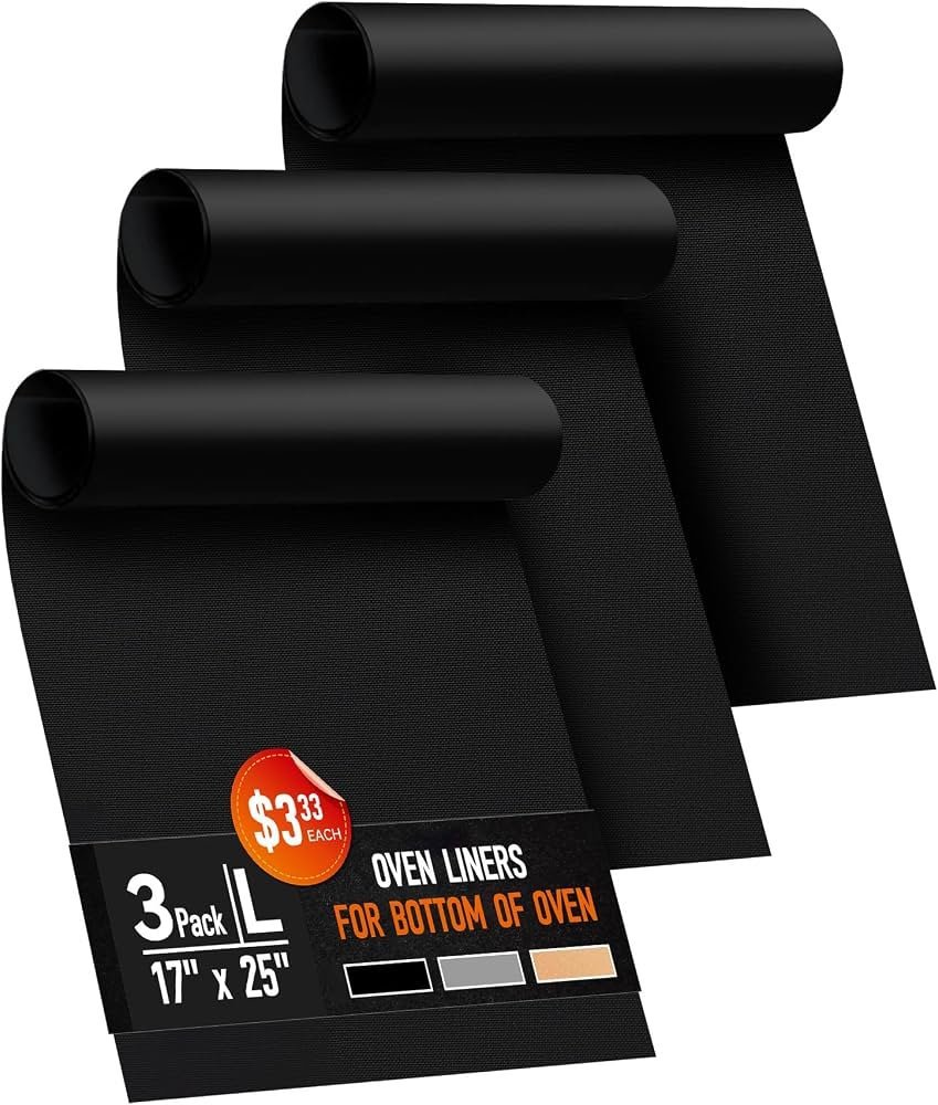 An assortment of oven liner samples placed next to an instruction manual.