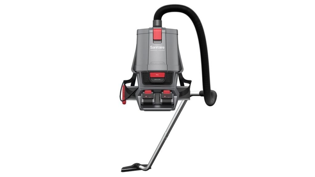 A modern cordless backpack vacuum stands ready for cleaning in a bright home.
