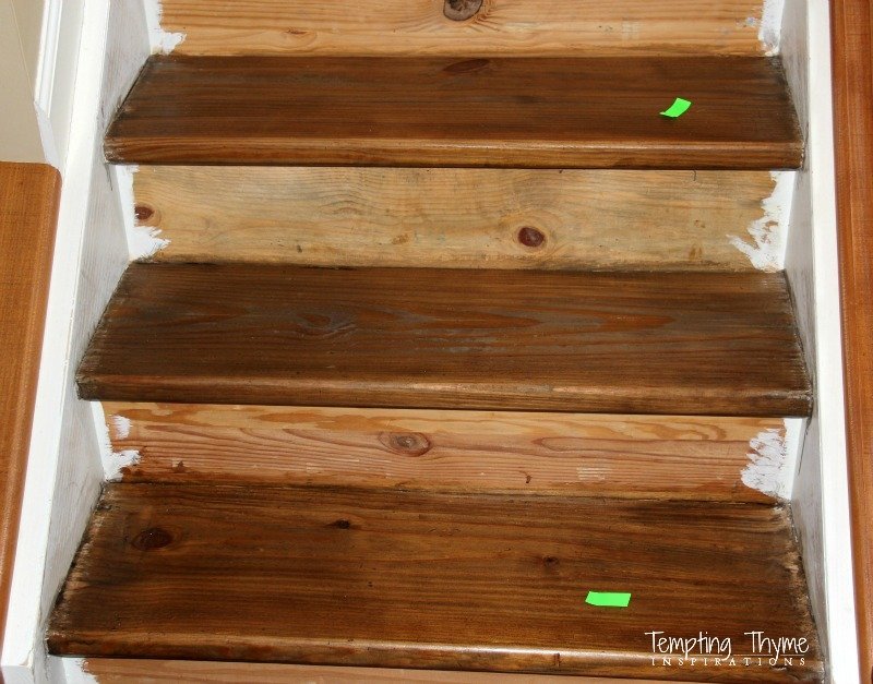 A beautifully finished pine wood staircase in a modern home with soft natural light.