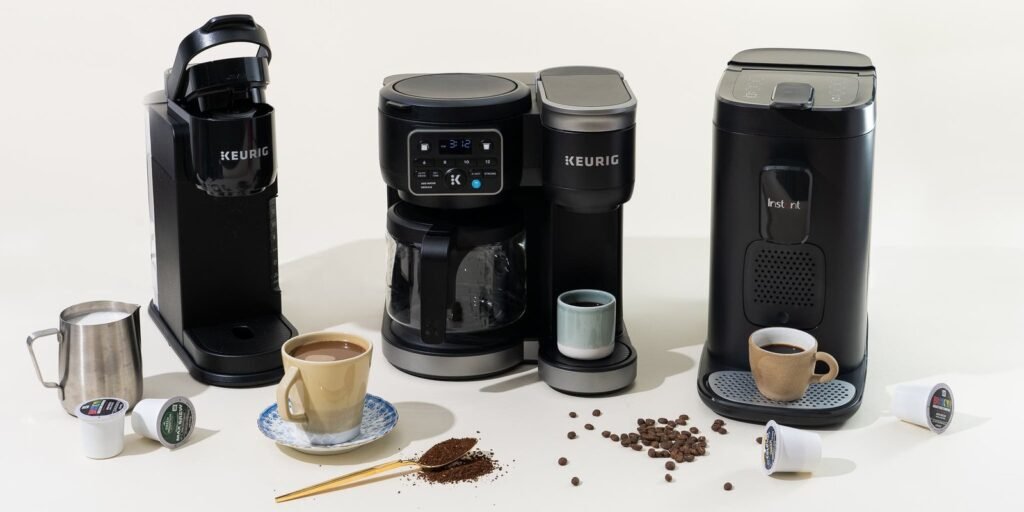 A modern coffee maker on a marble kitchen counter preparing delicious morning coffee.