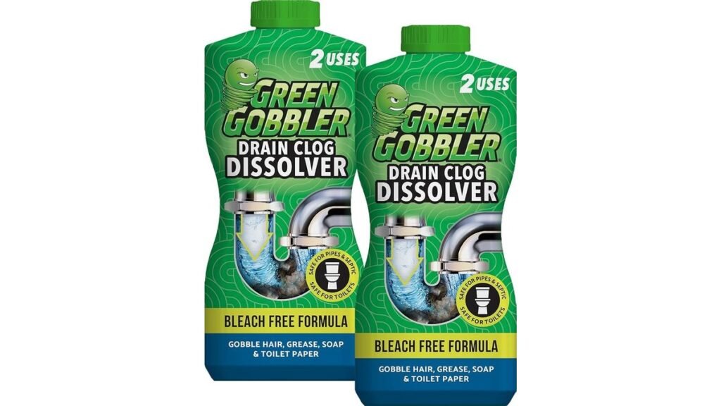 A bottle of liquid drain cleaner placed inside a modern, clean bathroom shower.