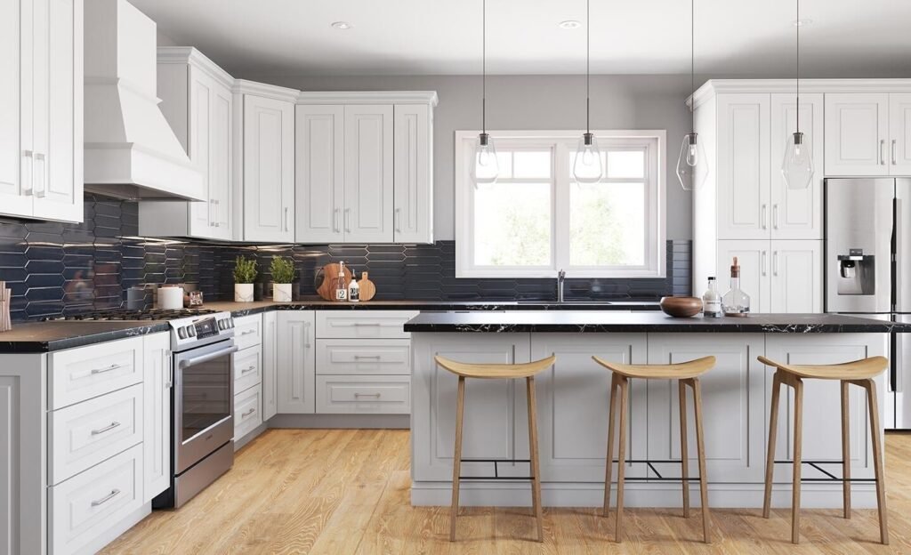 Modern kitchen featuring high-quality mid-grade shaker cabinets with elegant brass hardware accents.