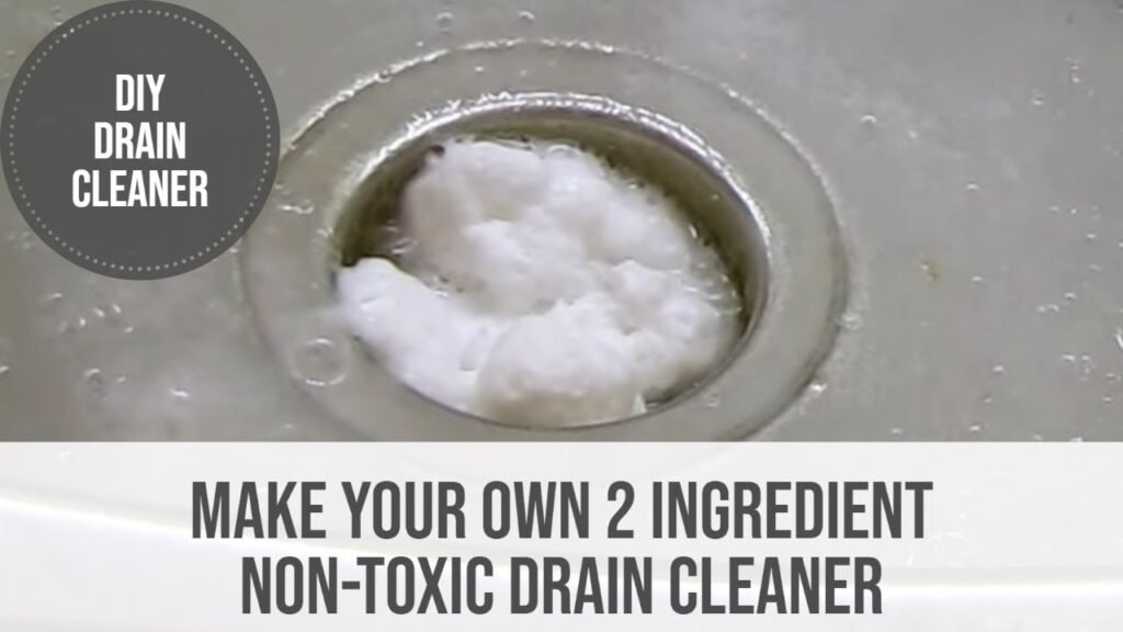 A bottle of eco-friendly non toxic drain cleaner sits on a clean kitchen counter.