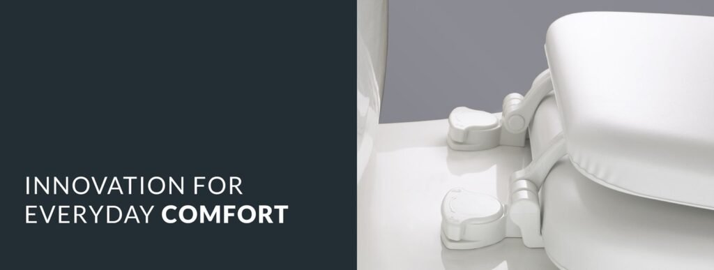 A comfortable padded toilet seat installed in a bright and modern bathroom.
