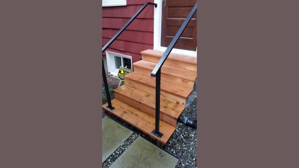 Freshly painted outdoor wooden steps with a durable finish in a garden setting.
