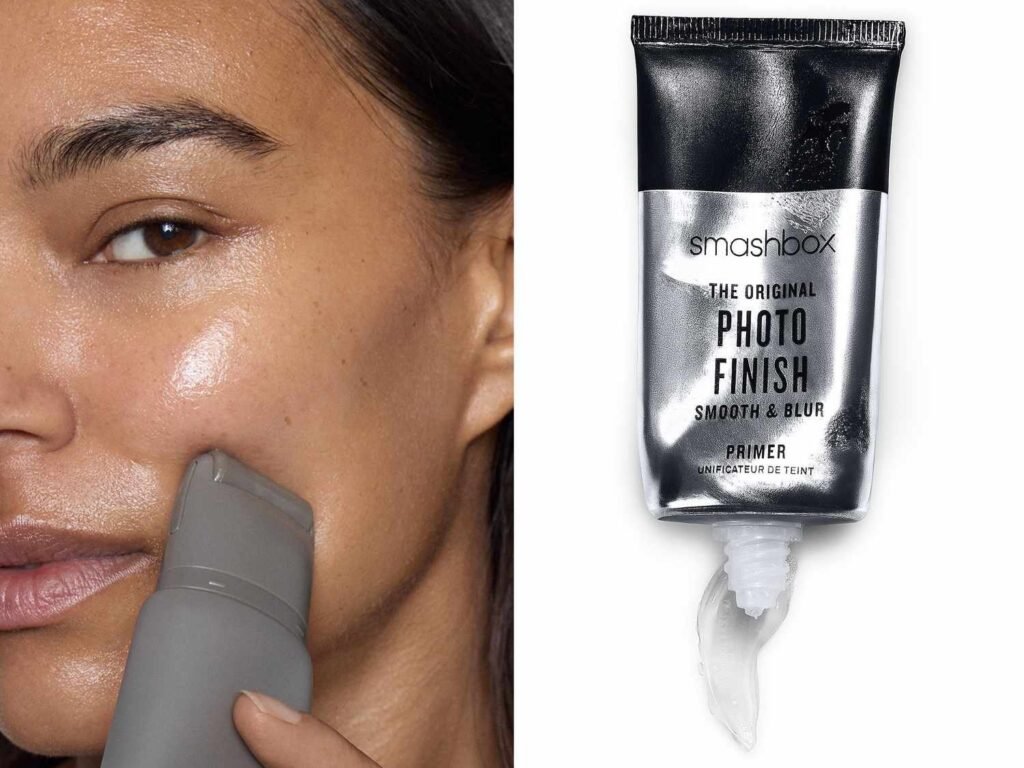 A woman with perfectly smooth skin applying a high-quality primer before texture makeup.
