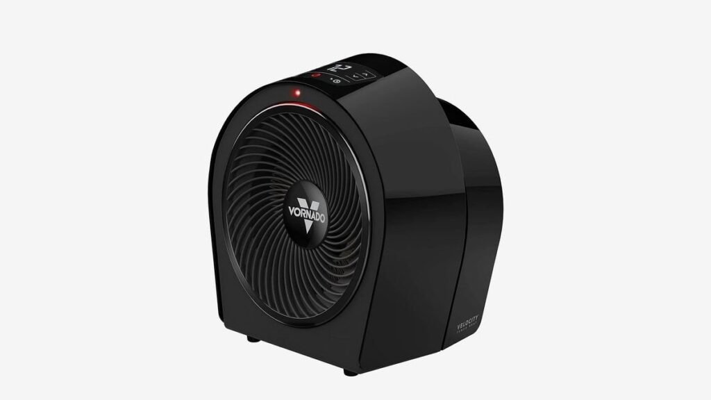 A modern space heater sits in a bright, peaceful yoga studio for hot yoga.