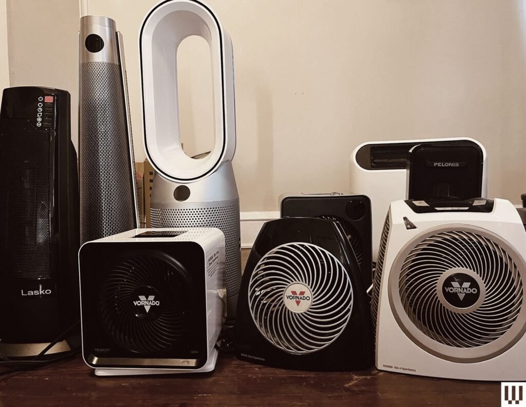 A modern tower space heater efficiently warms a large room with high ceilings.
