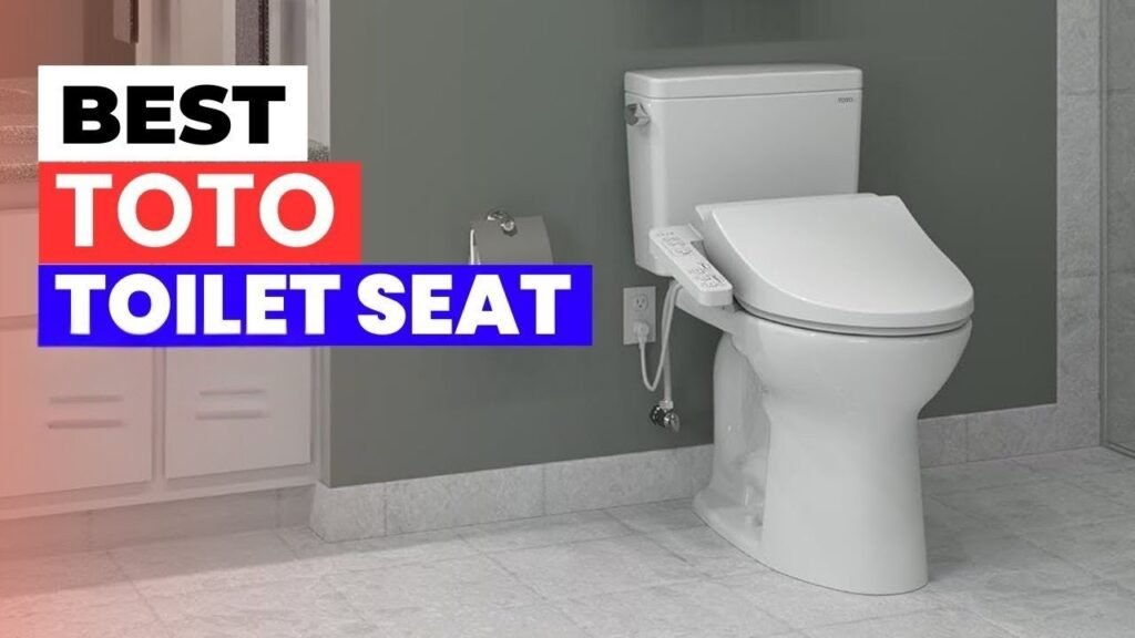 A modern elongated toilet seat installed on a Toto Drake toilet in a bright bathroom.