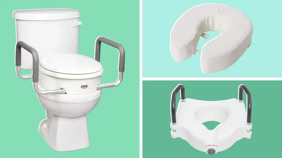 A modern toilet seat with integrated handles in a bright, accessible bathroom setting.