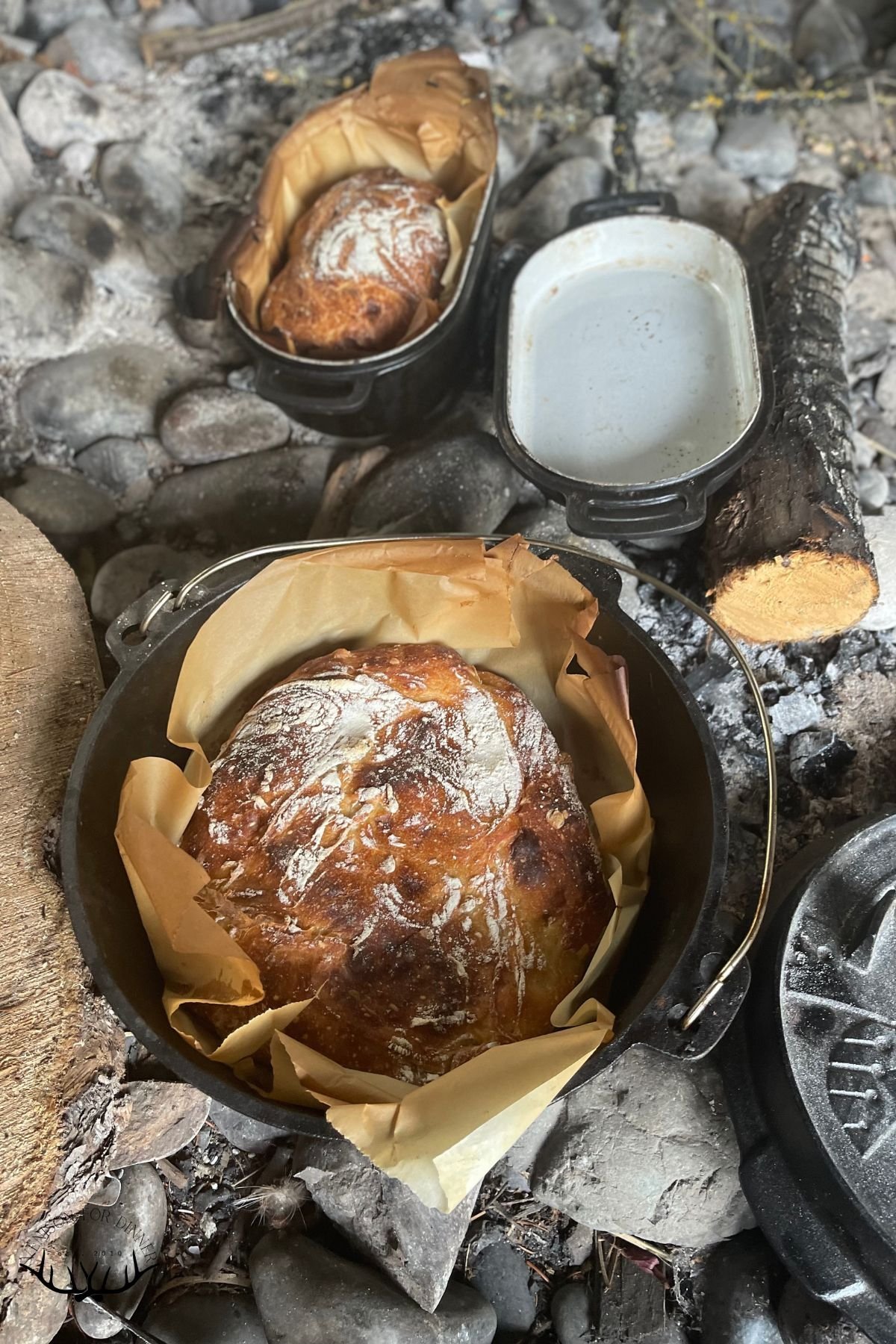 Essential tools and ingredients arranged for baking bread in a camping oven.