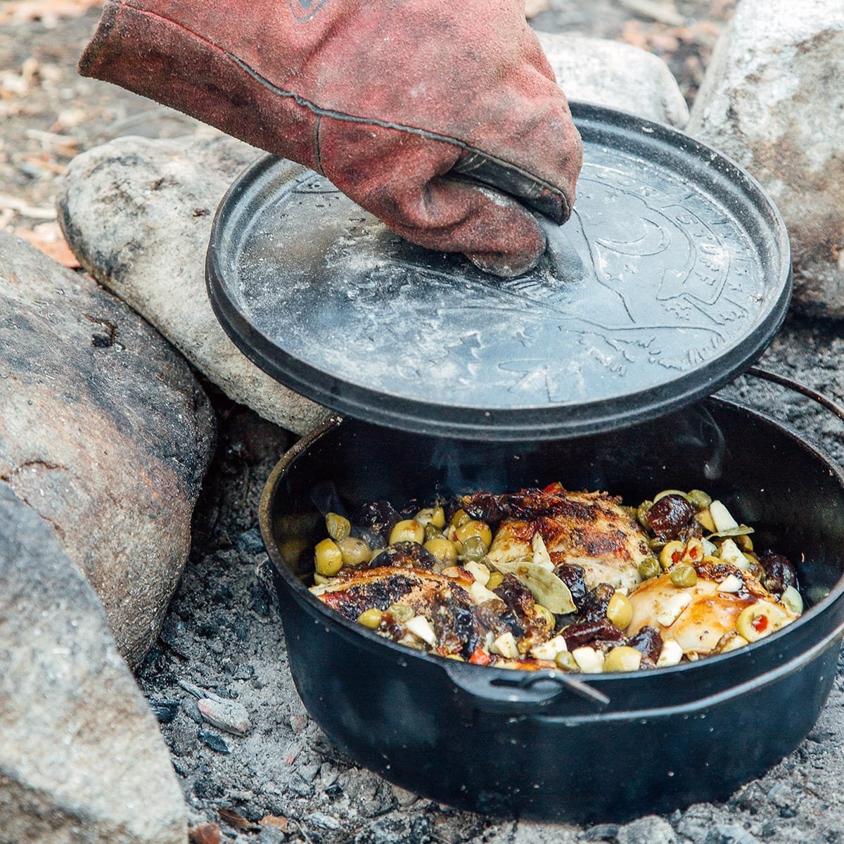 Troubleshooting cooking issues like uneven heat while preparing a casserole in camp.