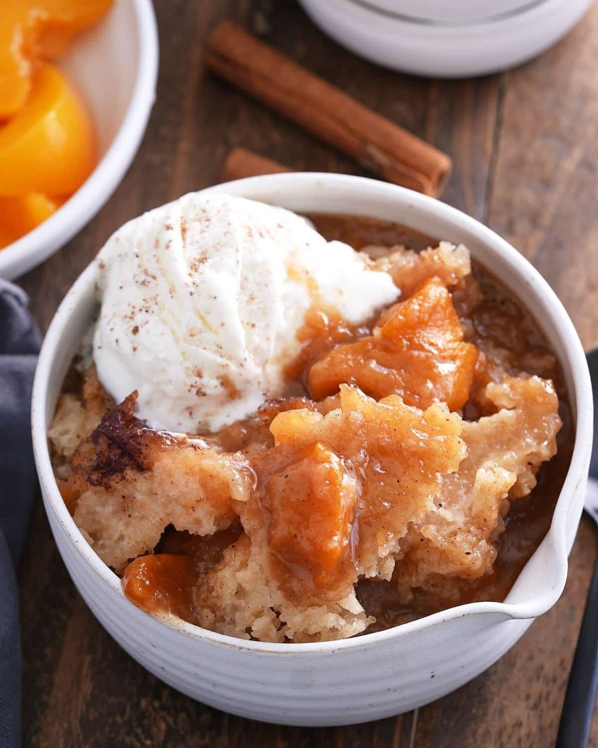 Troubleshooting a dessert made in a slow cooker with a tea towel to manage moisture.