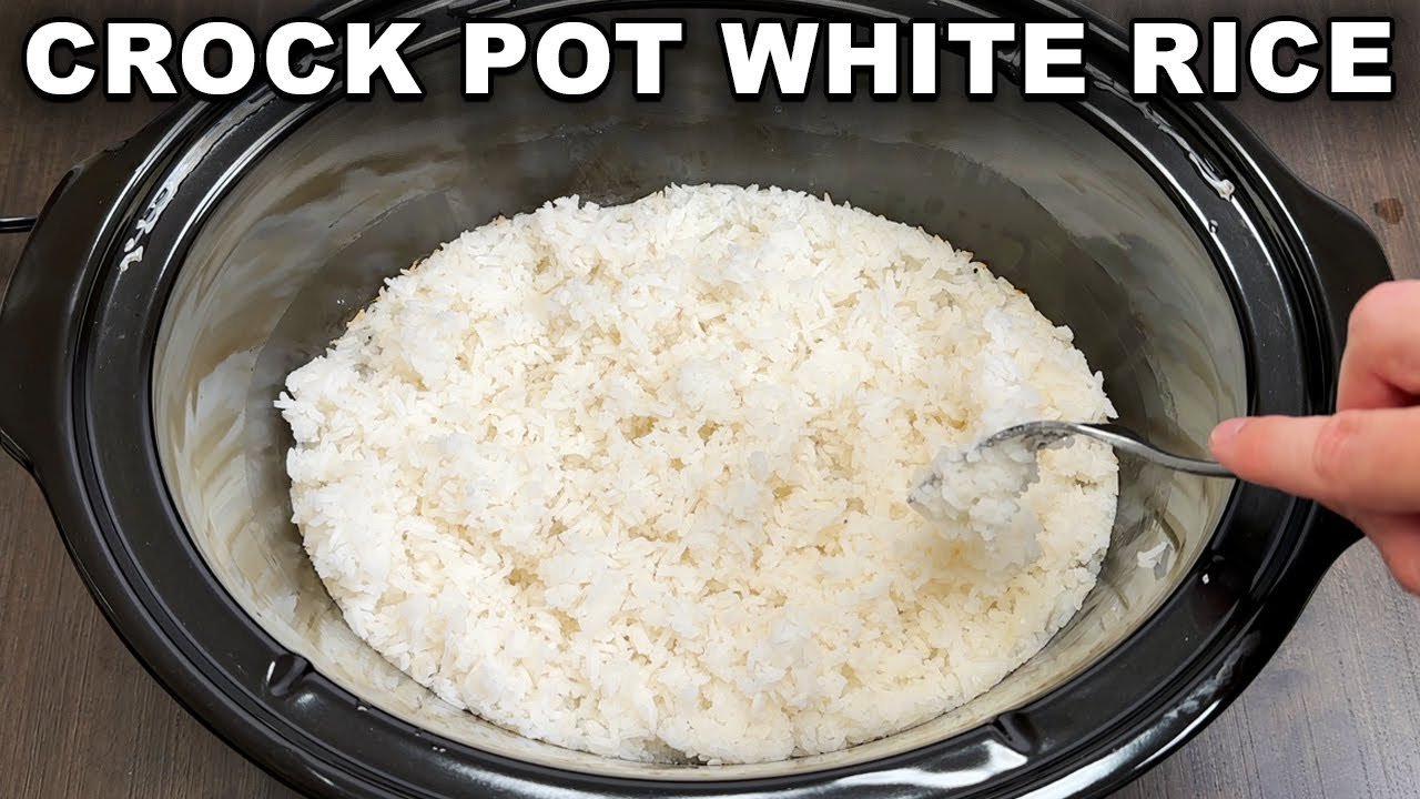 Home cook adding rice to a slow cooker filled with vegetables and broth.