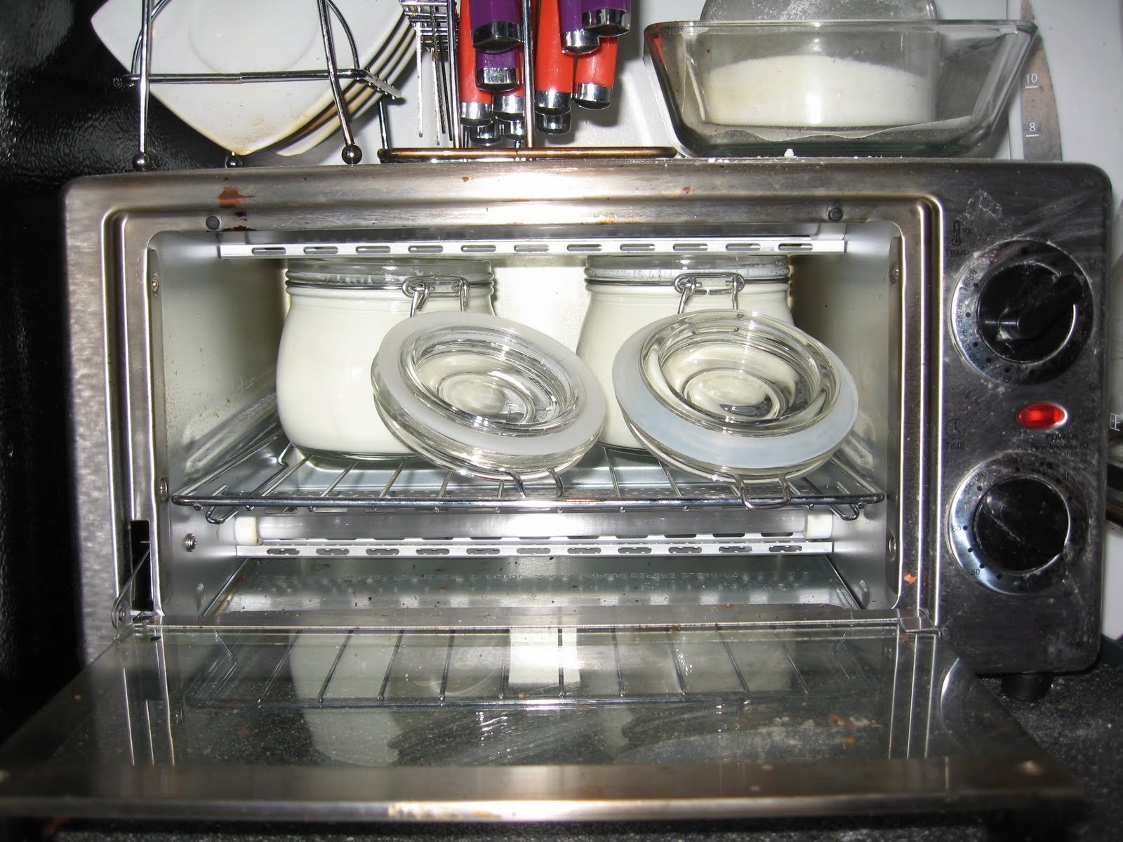 A close-up shot showing the thick and smooth texture of homemade yogurt.