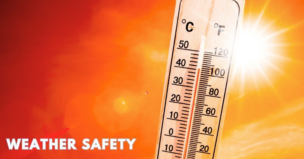 A homeowner inspecting an outdoor thermometer designed for severe climate fluctuations and temperatures.