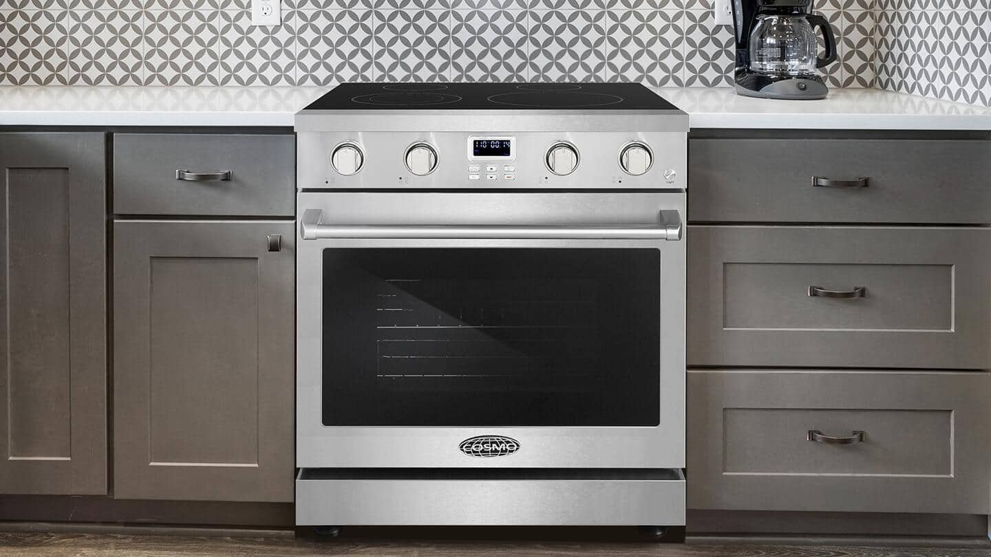 The internal fan of a convection oven circulating heat while roasting vegetables.