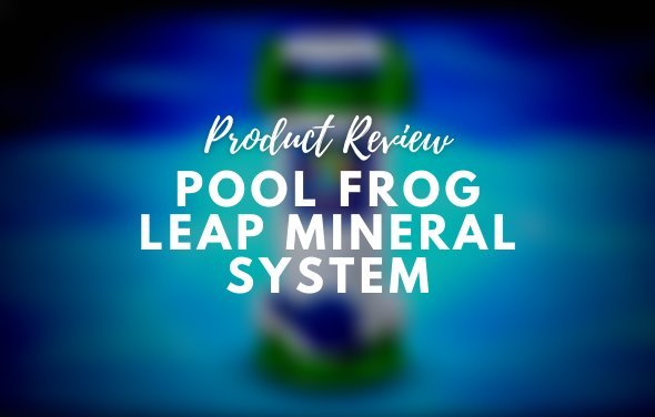 A modern Frog Leap pool system canister installed in a clean backyard swimming pool area.