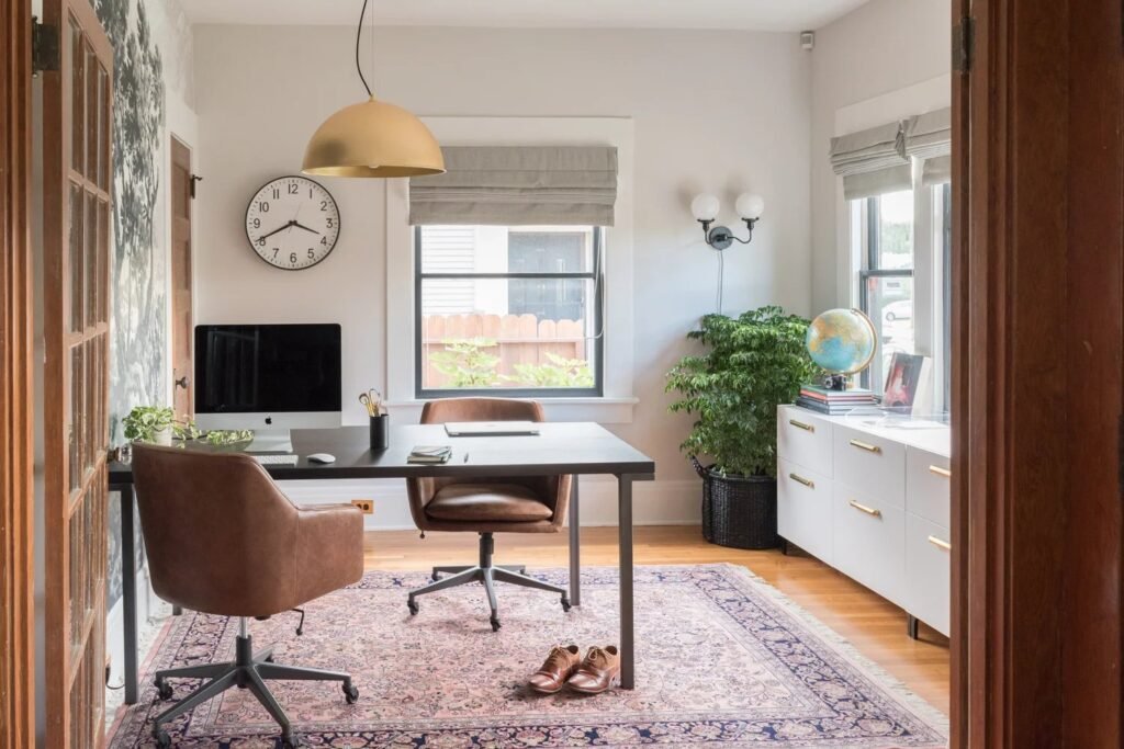 A perfectly organized home office desk with all computer wires neatly hidden away.