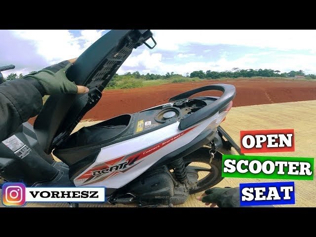 Tools needed for scooter maintenance including an ignition key, silicone lubricant, and cloth.