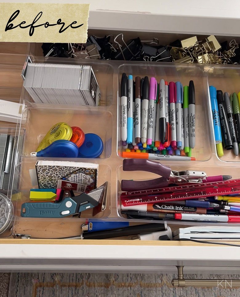 Essential tools for organizing office supplies laid out neatly on a clean wooden table.