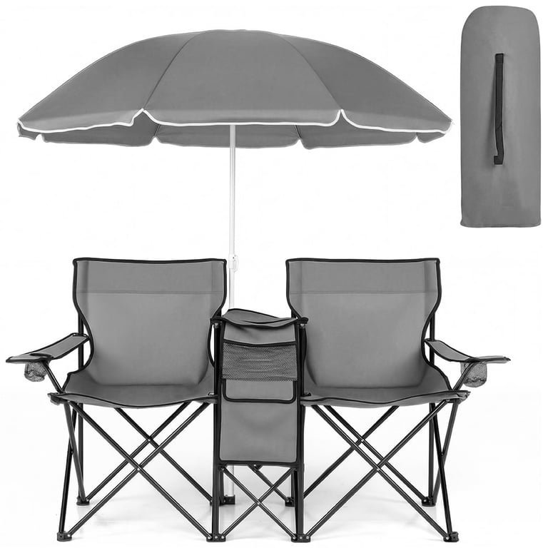 A person using a bungee cord to pack a folding chair.