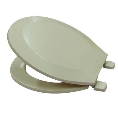 A clean toilet with polished hinges in a bright, modern bathroom setting.