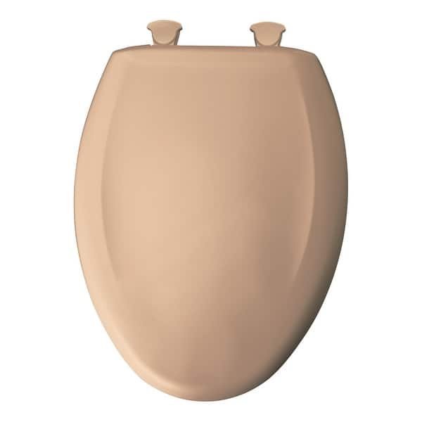A sturdy molded wood toilet seat being prepared for bathroom installation.