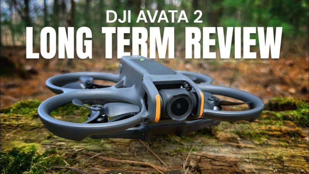 A modern DJI Avata 2 drone sits outside on a concrete path.