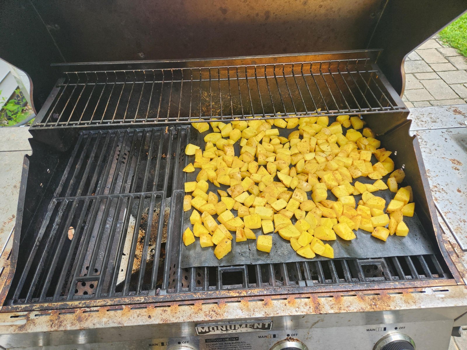 Adjusting a wire rack in an oven to troubleshoot uneven cooking issues.