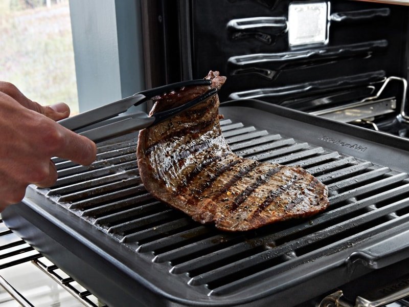 Preparation tools and ingredients for learning oven alternatives to grilling techniques.