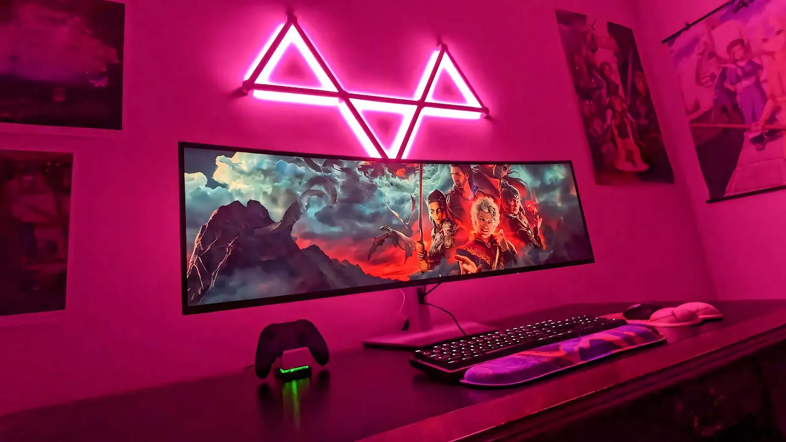 A professional reference monitor and a gaming monitor sit side by side.