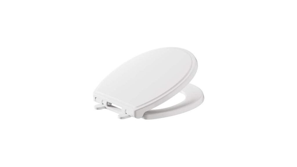 A modern white round toilet seat installed in a bright, clean minimalist bathroom.