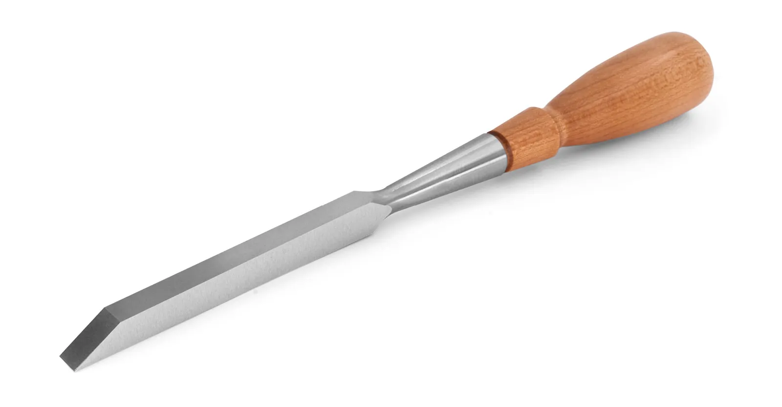 A sharp chisel blade resting on a leather strop near a sharpening stone.