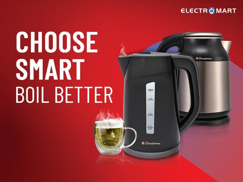 An electric kettle and a tea cup displayed in a bright modern kitchen.