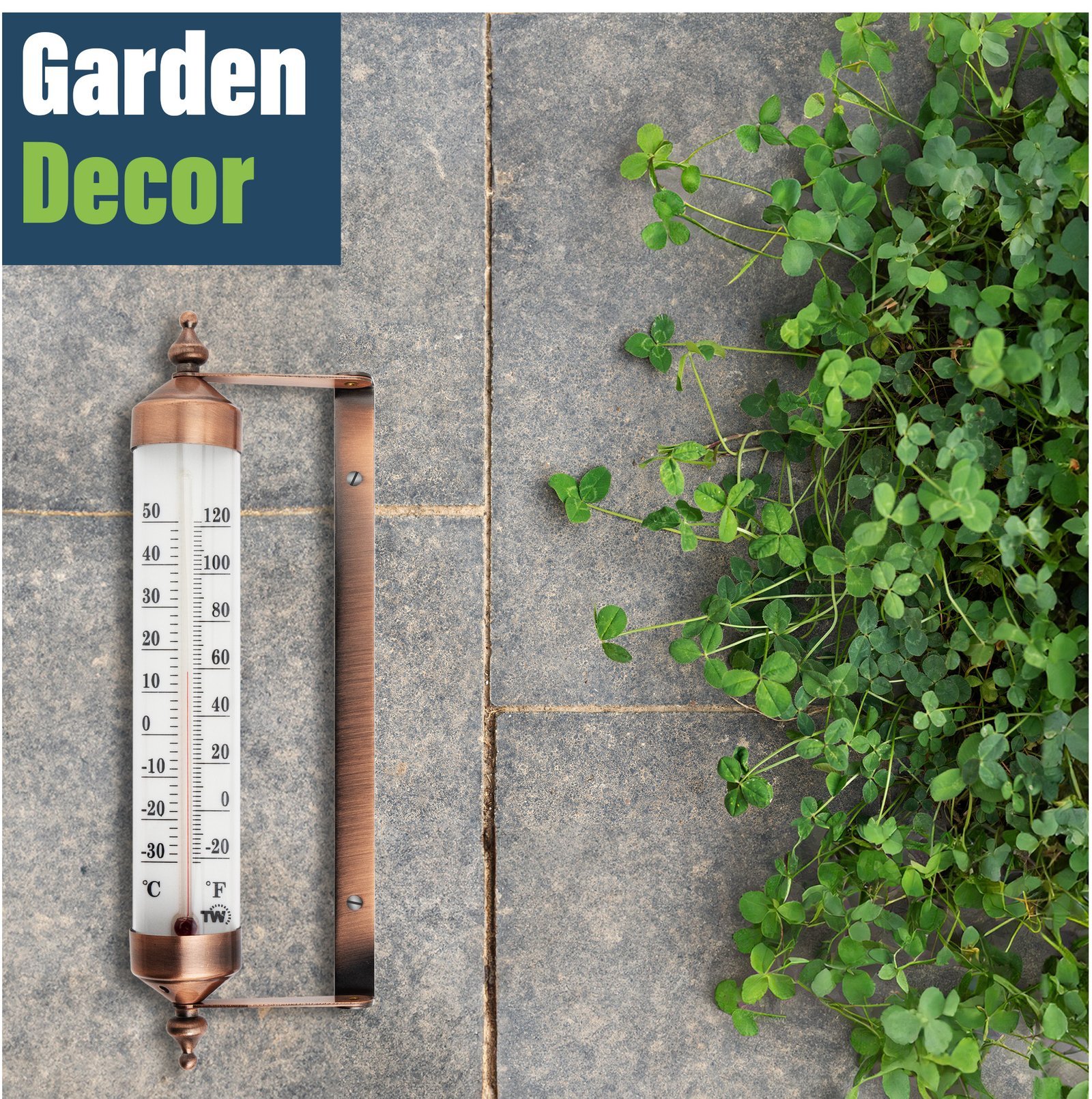 A person holding a digital garden thermometer display indoors near a window.