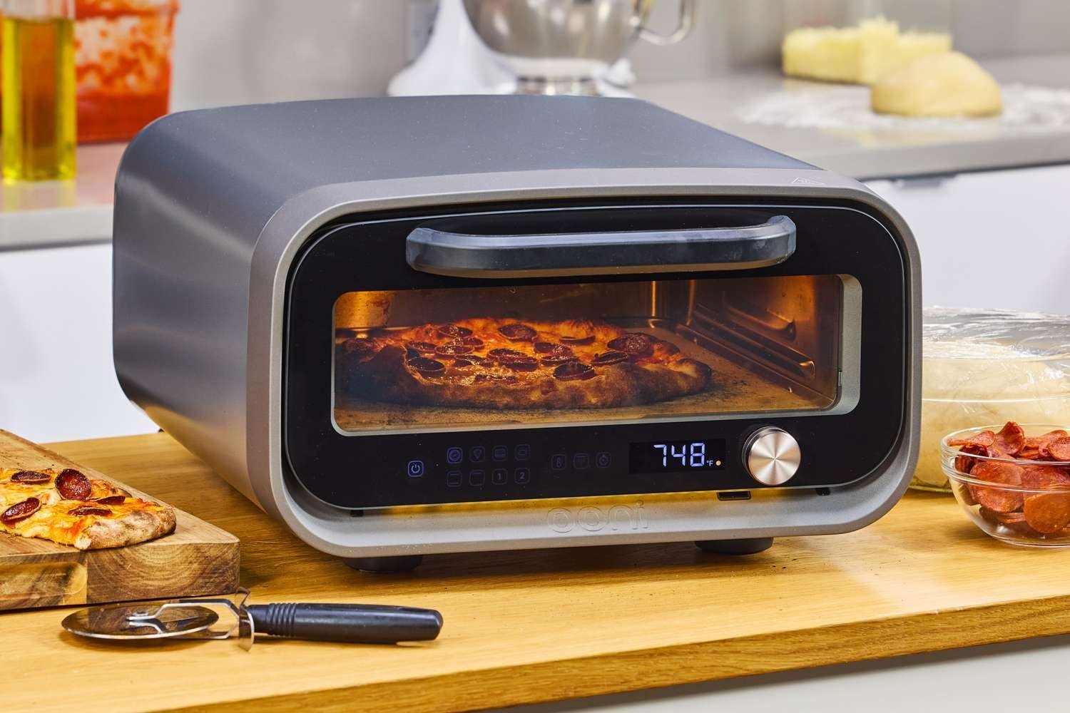 The intense heat and fire inside a high-performance pizza oven chamber.