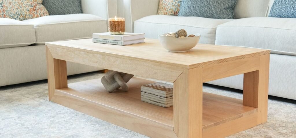 A beautiful solid walnut coffee table centerpiece in a bright and modern living room.