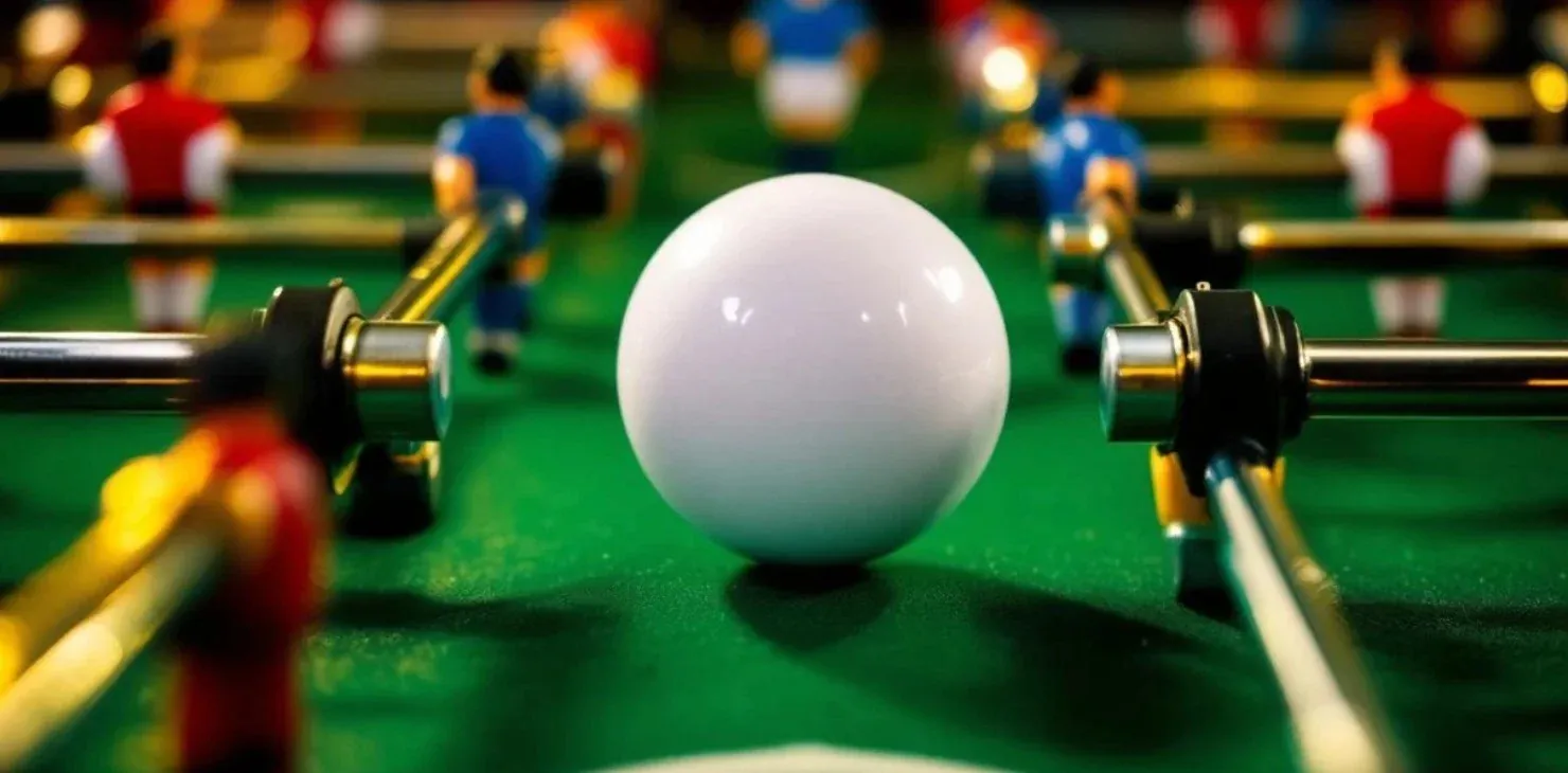 A cheap foosball table with bent rods shows poor quality construction