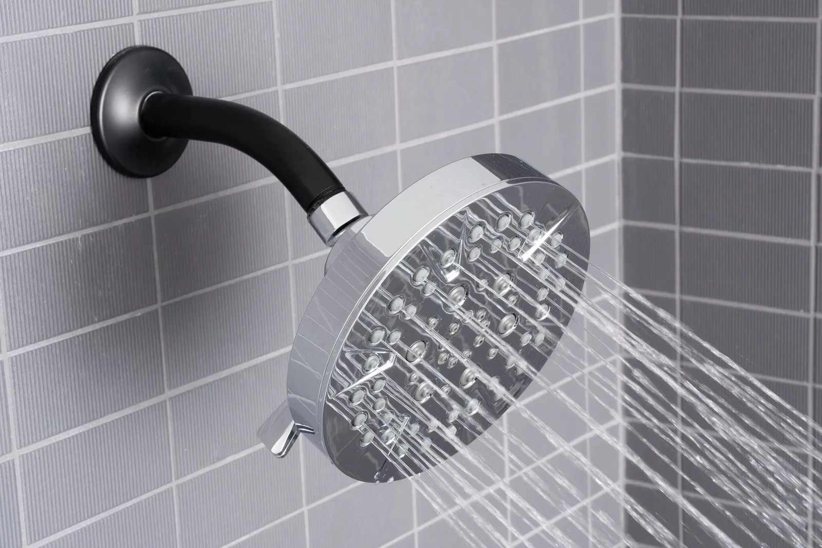 A close-up of a high-pressure shower head designed to maximize water flow.