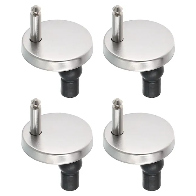 Close up of installing a top-fixing toilet seat hinge onto a porcelain bowl.