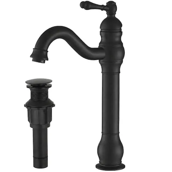 Close up of a metal sink drain tailpiece connected beneath a bathroom vanity.