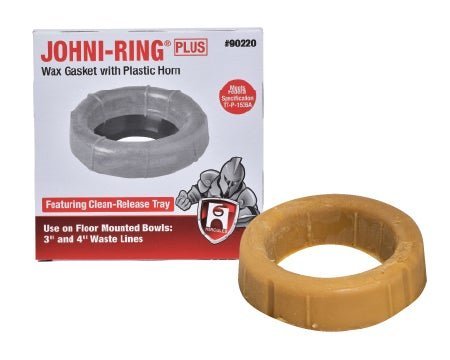 A collection of high-quality wax rings for toilets laid out on a bathroom floor.