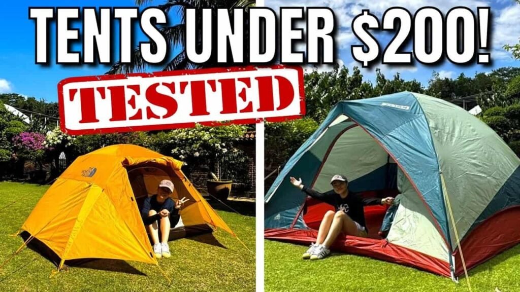 A compact camping tent set up in a peaceful forest clearing with gear nearby