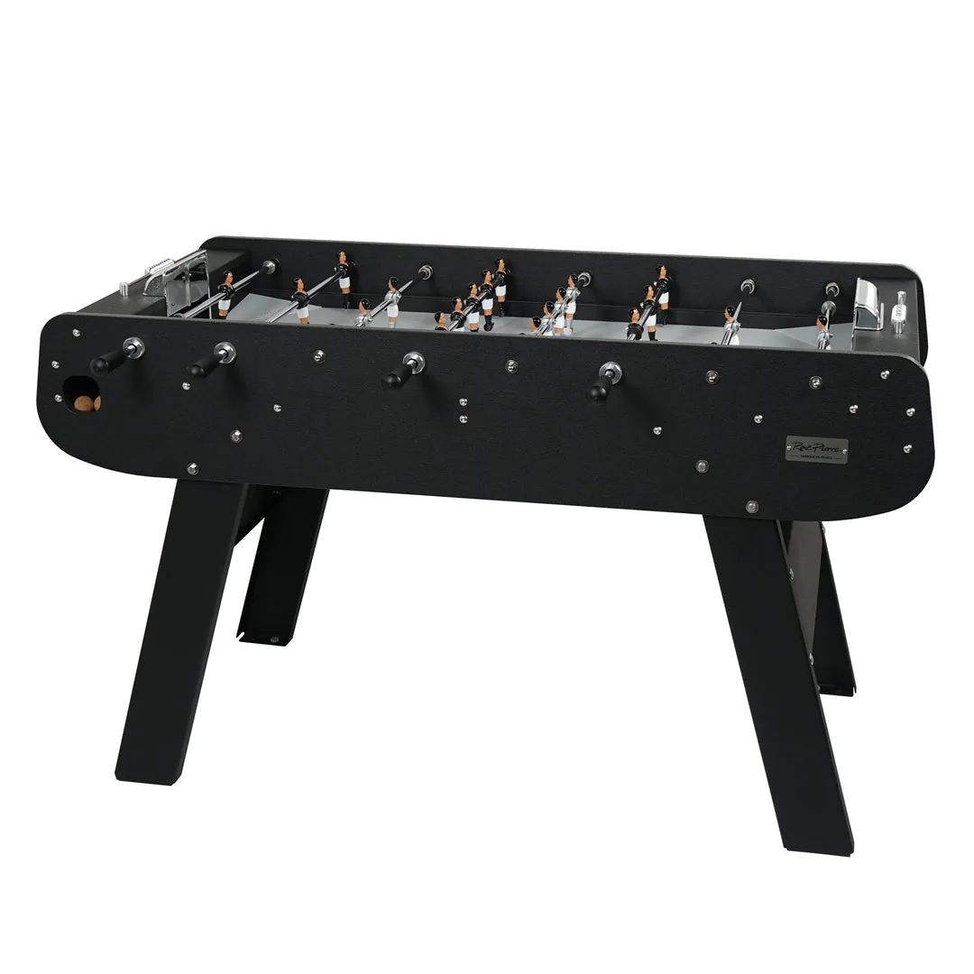 Compact foosball table fitting neatly on a modern kitchen counter for small spaces