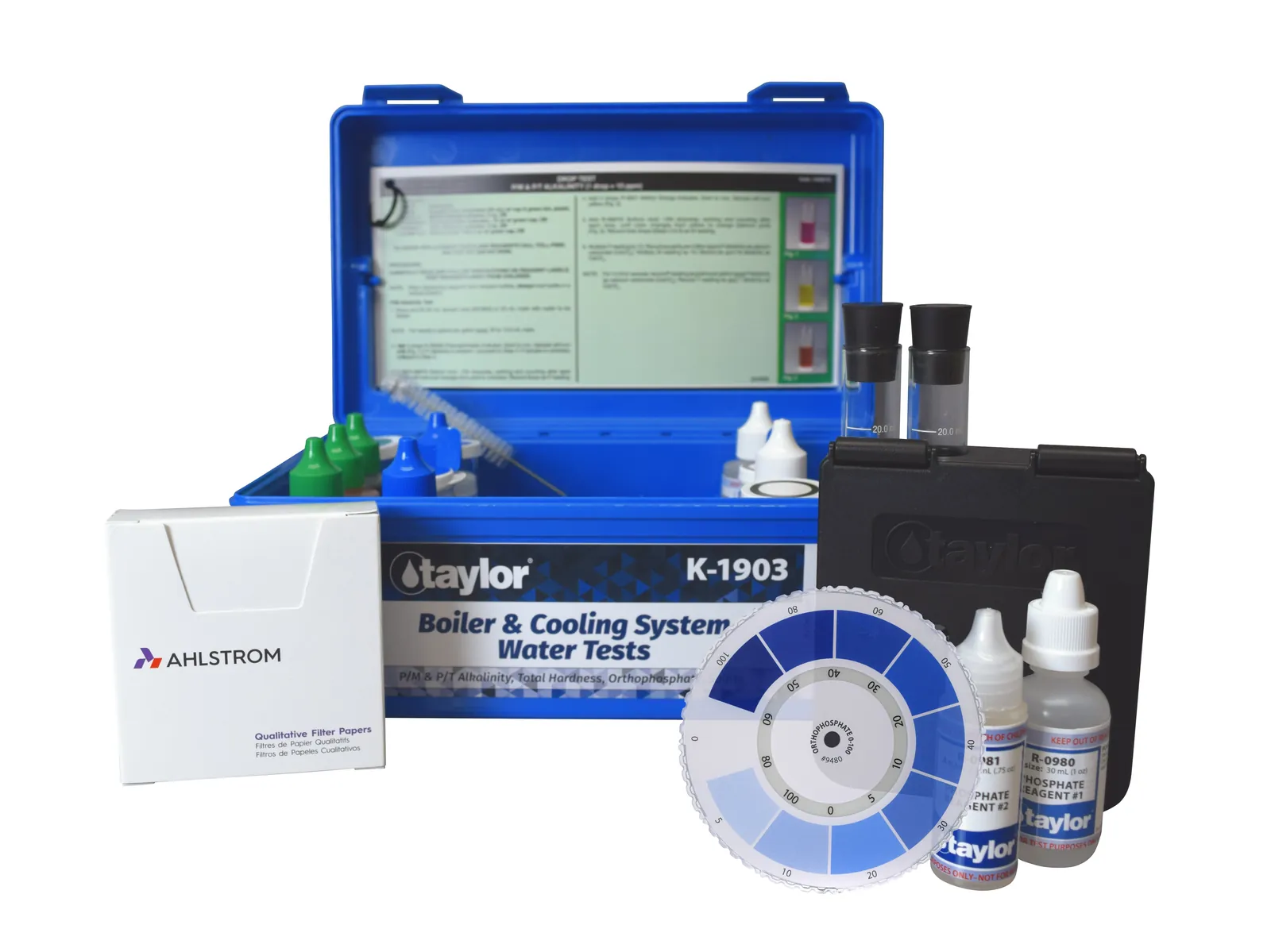 Comparison view of Taylor K-2006 and K-2006C pool testing kits on a desk.