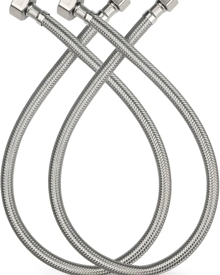 A durable PEX core braided supply line connected to a residential water heater.