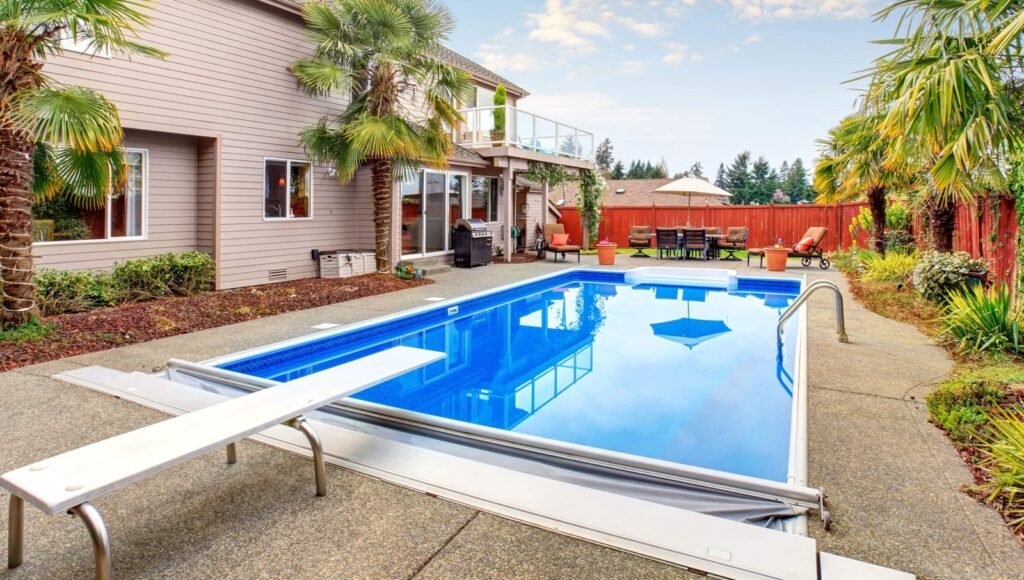 Floating chlorinator dispenser resting on clear blue water in a residential backyard pool.