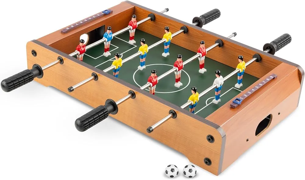 Foosball table feet on a scale demonstrating how much it weighs