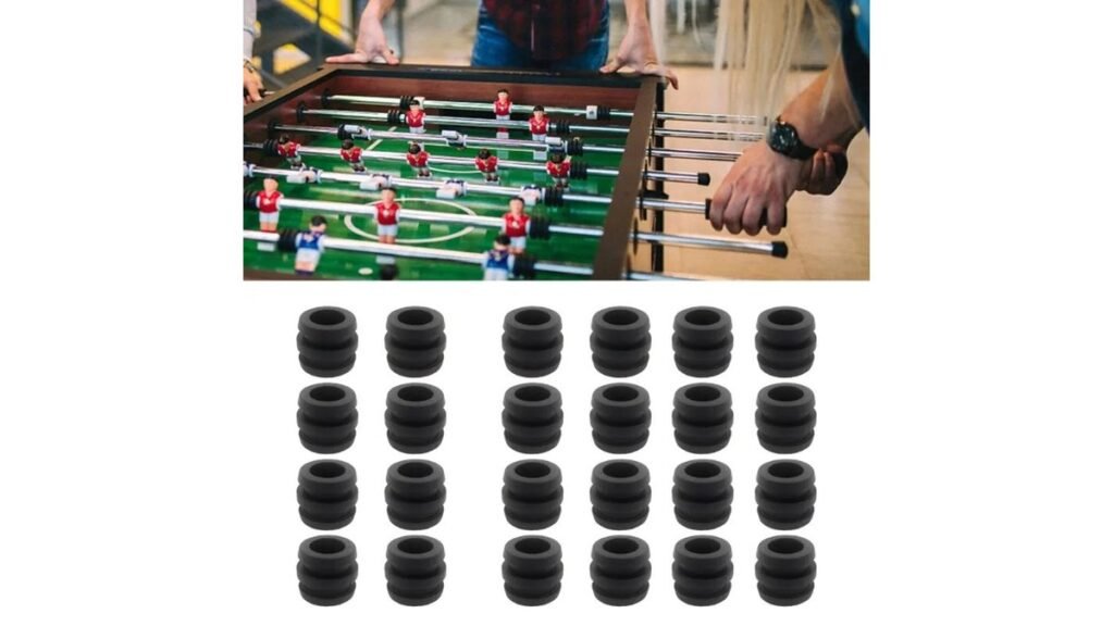 Foosball table replacement parts including bushings and bumpers on a workbench